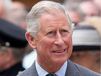 Adams & Prince Charles shake h...